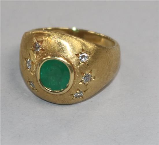 A textured yellow metal, collet set emerald and gypsy set diamond dress ring, size O.